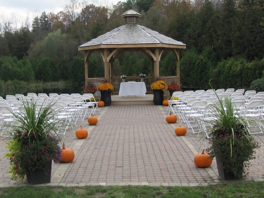 Outdoor wedding venue in Durham Rolling acres has a gazebo overlooking the water