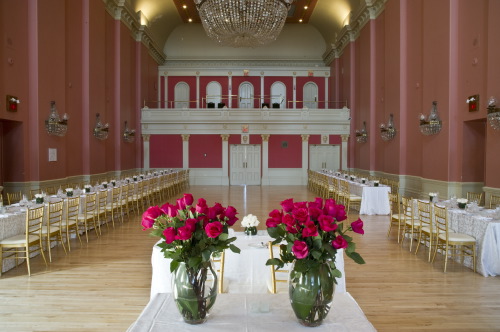 The grand hall in st,lawrence hall in toronto featuring its soft pink walls