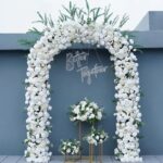 White Champagne Flower Archway Rental