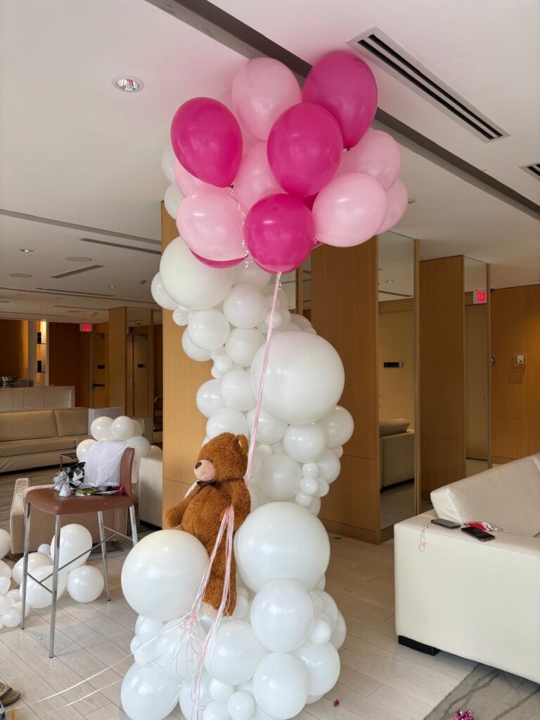 Birthday balloon decor with a plushie
