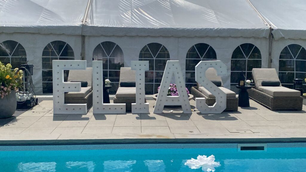 Marquee letters that spell out a name
